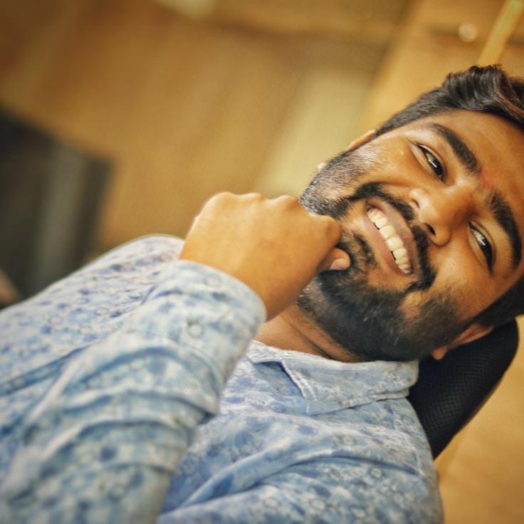 Kaveri Mehta, Lead Design Curator at True Cloud Parcel, reviewing corporate floral arrangements